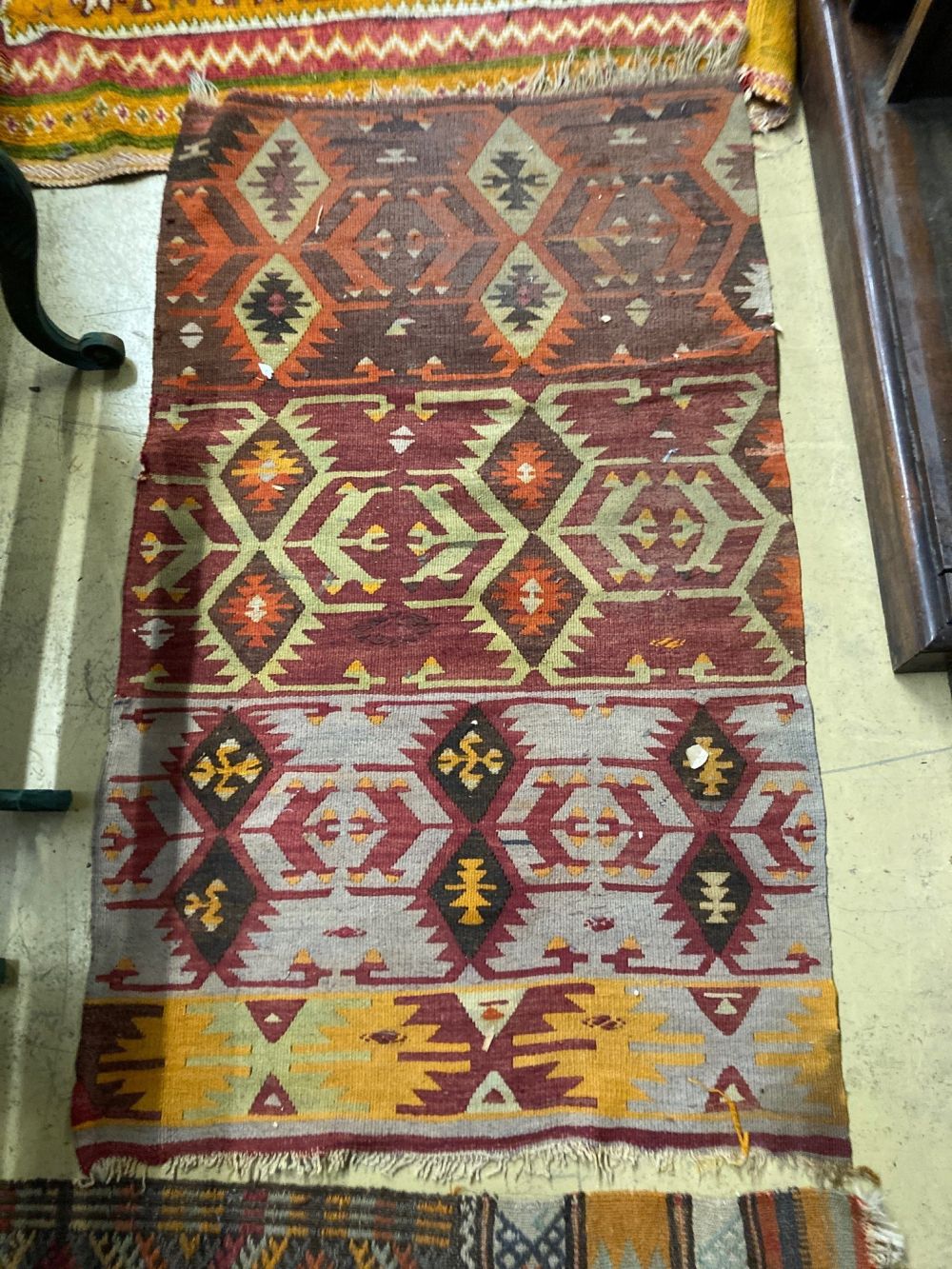 A Kelim and other rugs, largest 240 x 140cm (4)